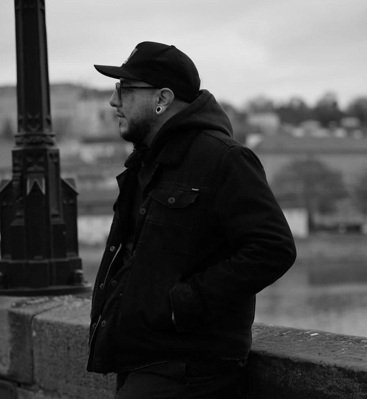 Black and white portrait of Sebastian, the tattoo artist behind cbastianink.